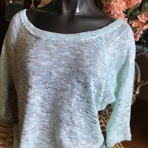 Nice neckline frames your face lovely .